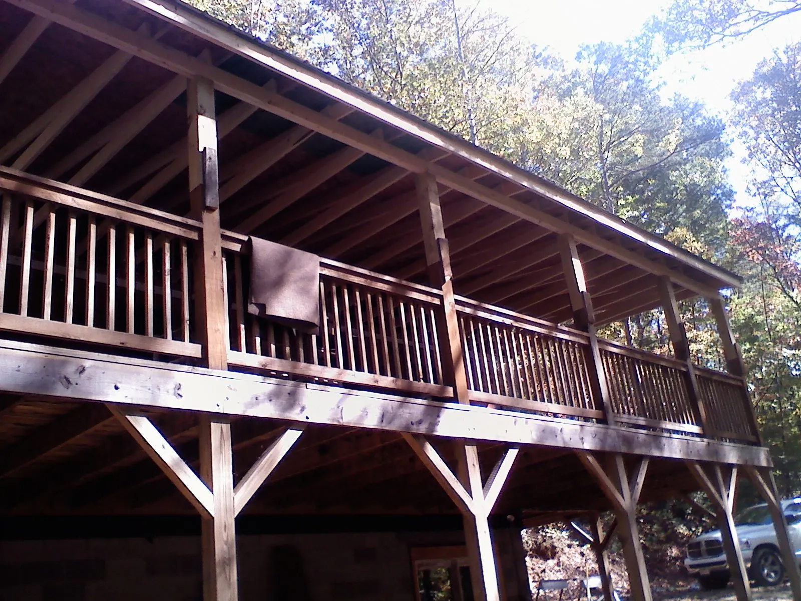 Timber framing under a new elevated porch and deck — Roof Leak Repair in Princeville by Roofing Brothers